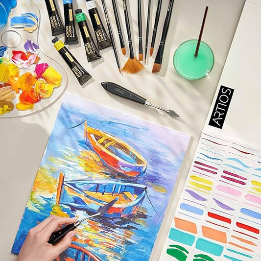 Artist painting a colorful landscape on canvas with acrylics