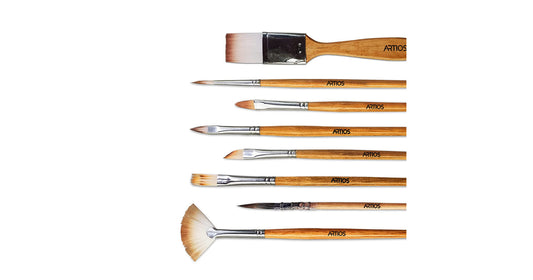 8 ARTIOS assorted paint brushes laid flat showing round, flat, and filbert shapes