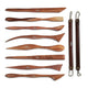 ARTIOS Clay Modelling Tool Set of 10, 8 wooden sculpting tools with various shaped tips and 2 wire loop tools laid flat on white background
